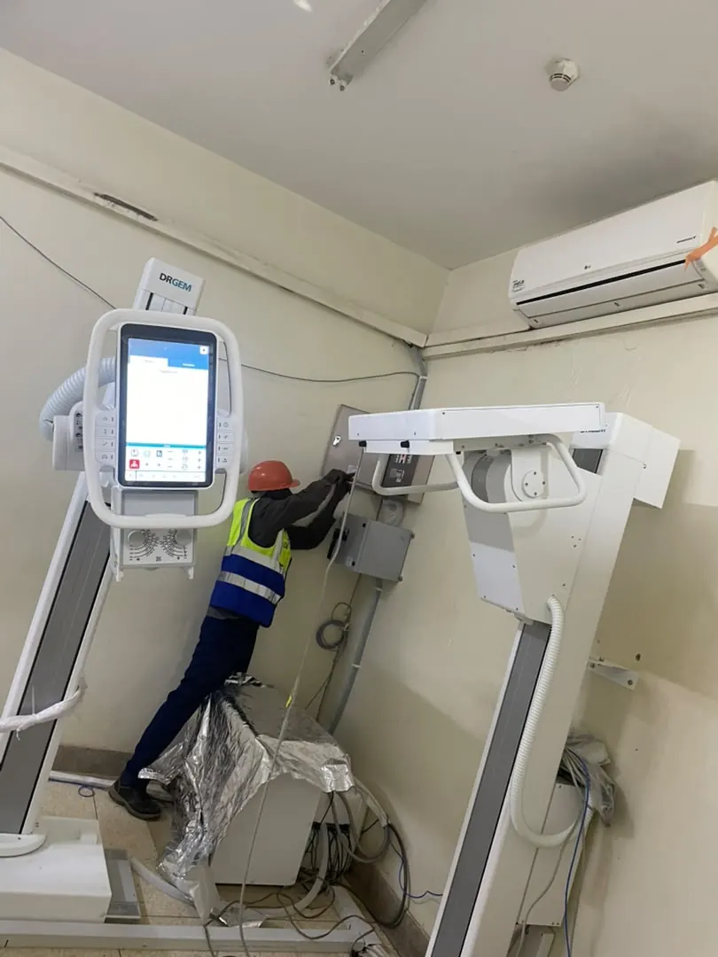 Klan Logistics technician installing diagnostic X-ray equipment